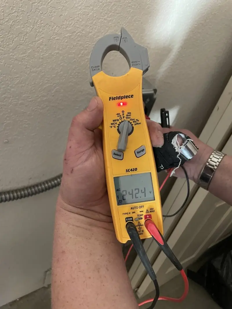 Voltage testing with clamp meter during Recessed Lighting Installation in Pacheco